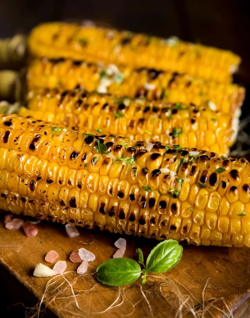Charred street corn with herbs and salt
